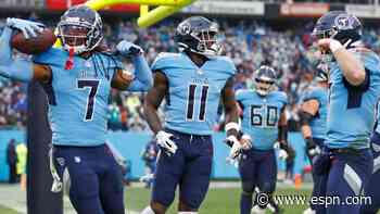 Tannehill, Titans top Dolphins, clinch division title