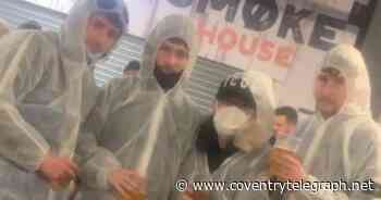Coventry City fans baffle supporters by attending game in hazmat suits - Coventry Live