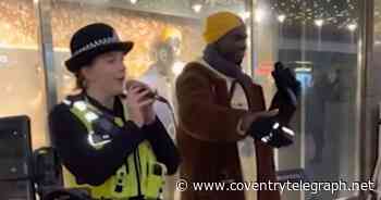 Watch as Coventry police officer stops to sing Adele with busker - Coventry Live