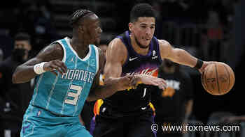 Devin Booker scores 24 points, depleted Suns rout Hornets