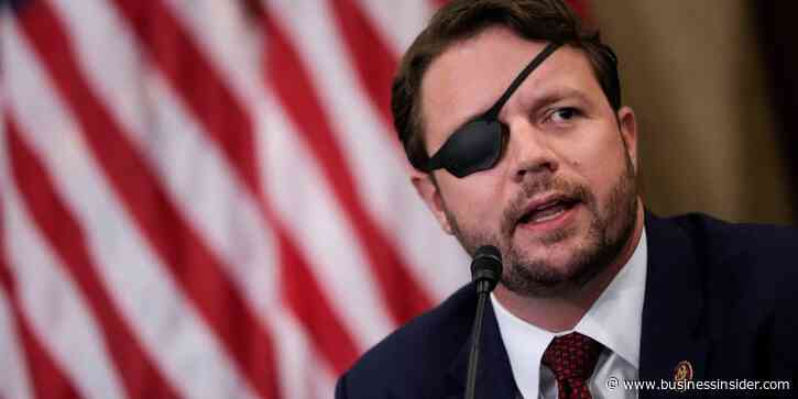 Rep. Dan Crenshaw says Marjorie Taylor Greene is either 'a Democrat - or just an idiot' amid COVID-19 testing spat