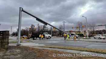Traffic signal pole falls near Suffolk's Harbour View East shopping center