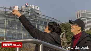 China: Evergrande shares rise as Hong Kong trading resumes