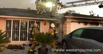 Family Trapped in Burning House Saved After Family Member Grabs Firefighter Through Barred Window