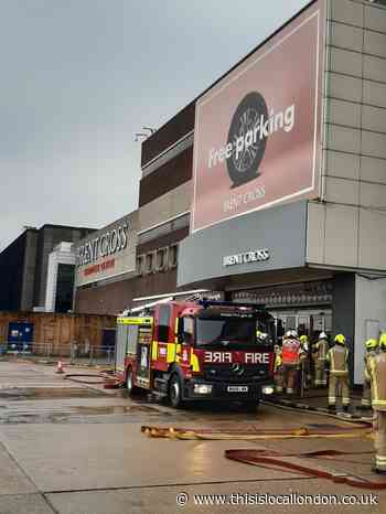 Firefighters tackle fridge on fire at Brent Cross