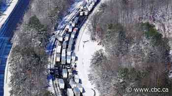 Hundreds stuck for nearly a day on highway after Virginia snowstorm