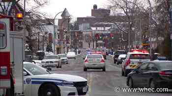 Woman arrested after 18-year-old stabbed near school