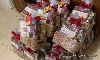 Shopper buys 20 massively reduced Kmart food hampers saving $580 and plans to donate them to charity - Daily Mail