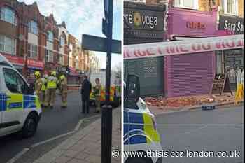 Police and fire service attend after bricks fall in North Finchley