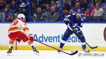 Kucherov records 2 assists in return to lineup to help Lightning defeat Flames