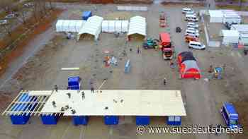 Karlsfeld: Mit dem Auto zur Impfung - Süddeutsche Zeitung - SZ.de