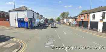 Suspected stolen car in crash at junction of Wigan Road and Deane Church Lane