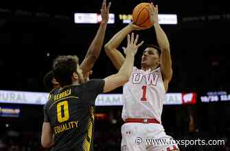 Johnny Davis leads Wisconsin to 87-78 victory over Iowa