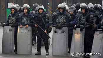 Kazakhstan leader gives 'kill without warning' order, as bodies lie in the streets