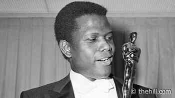 Biden plays tribute to Sidney Poitier