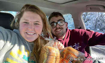 Local bakery truck gives out bread to stranded drivers in I-95 traffic jam