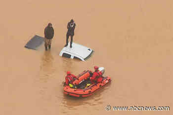 Rising floodwaters prompt interstate closures and evacuations in Washington state