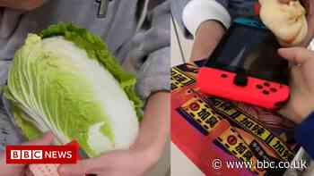 China: Xi'an residents in lockdown trade goods for food amid shortage - BBC News