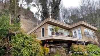 Man rescued after house slides off its foundation in Seattle following heavy rain
