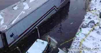 Man taken to hospital after transport truck lands in Bras d'Or Lake - SaltWire Network