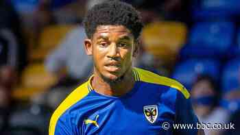 Corie Andrews: Colchester United sign AFC Wimbledon striker on loan