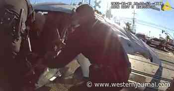 Stunning Footage: Heroic Police Officers Pull Crash Victim from Tracks 3 Seconds Before Train Obliterates Vehicle