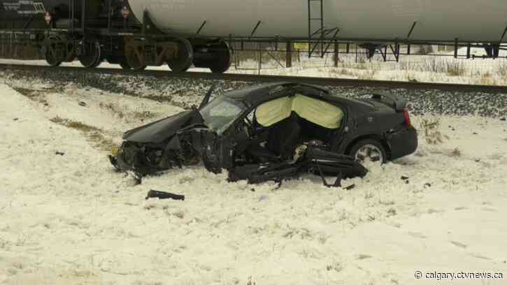 Driver in critical condition after train strikes car north of Innisfail