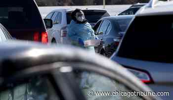 Long lines at Aurora coronavirus testing site as COVID-19 cases surge - Chicago Tribune