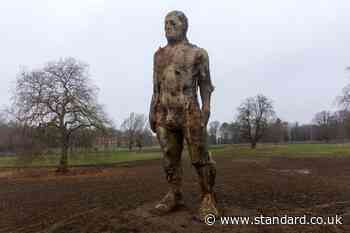 Drivers stop to photograph 26ft statue of nude man dubbed the Suffolk Colossus