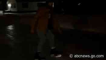 WATCH:  Michigan man skates down icy road