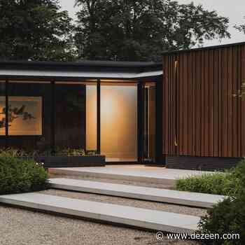 Thermo-ash cladding gives tone and texture to Dutch forest house - Dezeen