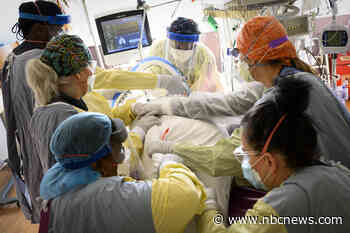 U.S. reports record 1.3M Covid cases in a day as hospitalizations soar