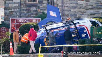 Investigators probe wreckage of crashed medical helicopter