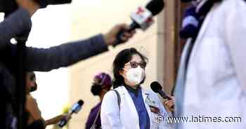 California to coronavirus-positive healthcare workers: Keep working - Los Angeles Times
