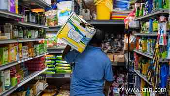 Omicron is pushing grocery workers to the brink, but they need to make a living