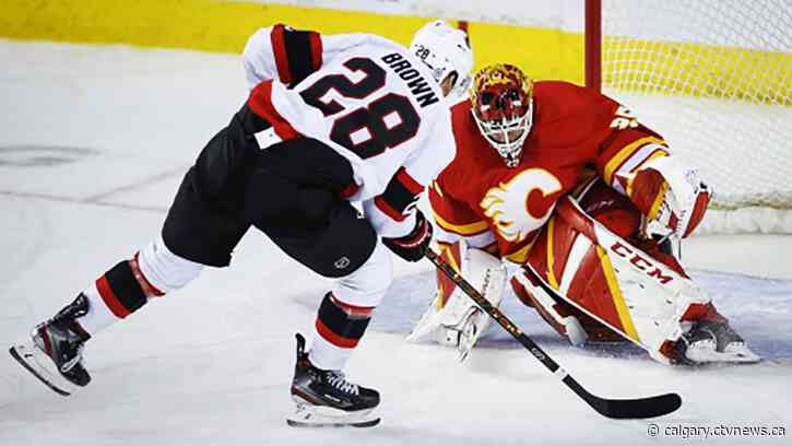 Murray collects first win of the season as Senators upset Flames 4-1