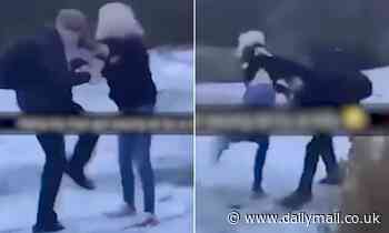 Woman 'tries to headbutt schoolboy after his mate threw a snowball at her car' in Oldham
