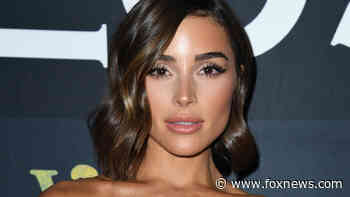 Olivia Culpo asked by American Airlines to put on a blouse ahead of flight