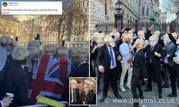 100 people in Boris Johnson face masks and suits dance outside Number 10 in Downing Street flashmob