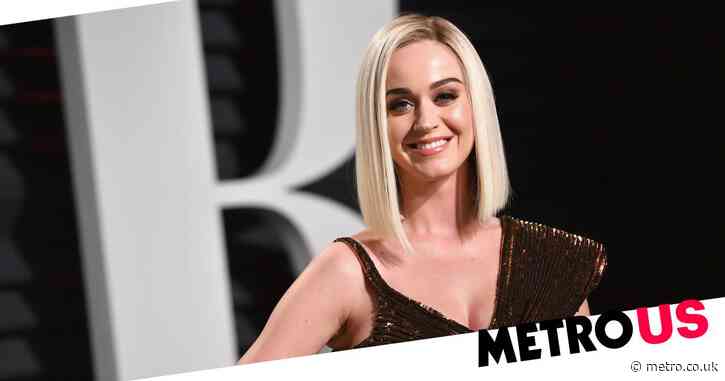 Katy Perry poses topless in fire photoshoot but Orlando Bloom has different priorities