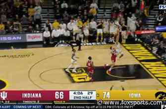 Kris Murray comes up with the steal and finishes it with a one-handed dunk to increase Iowa’s lead
