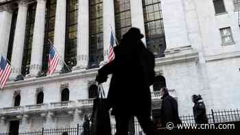The Dow falls as big banks get pummeled