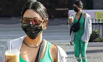 Vanessa Hudgens showcases her fit frame in green sports bra and matching leggings