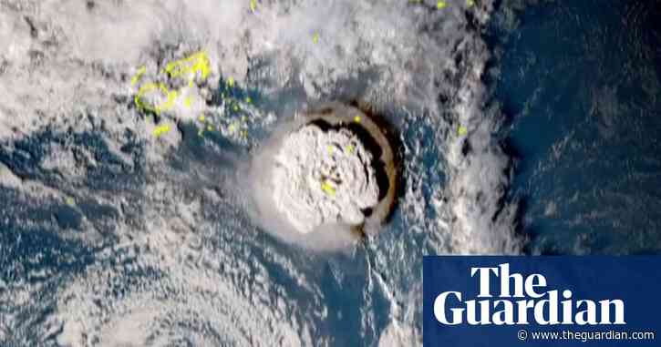 Tonga: tsunami floods streets and cuts communication after undersea volcano erupts