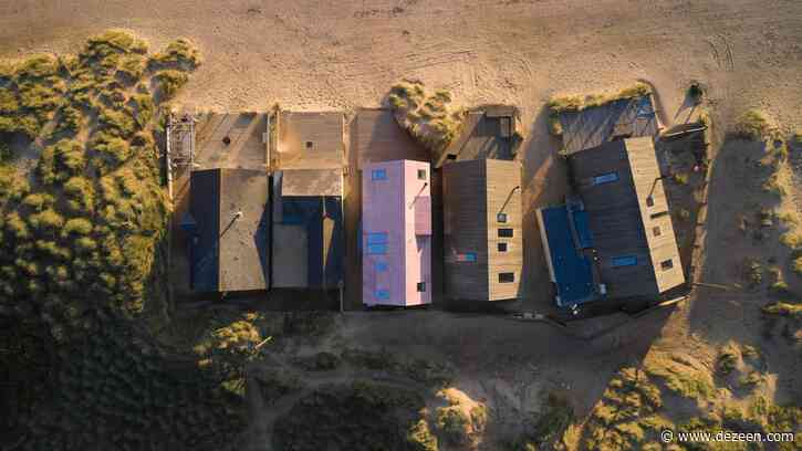 Pink concrete covers "fun house" on English coast by RX Architects