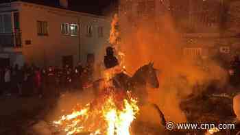 Watch these horses jump through 'purifying' fire