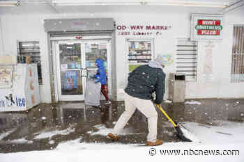 Powerful winter storm slams East Coast, leaving thousands without power and flights canceled