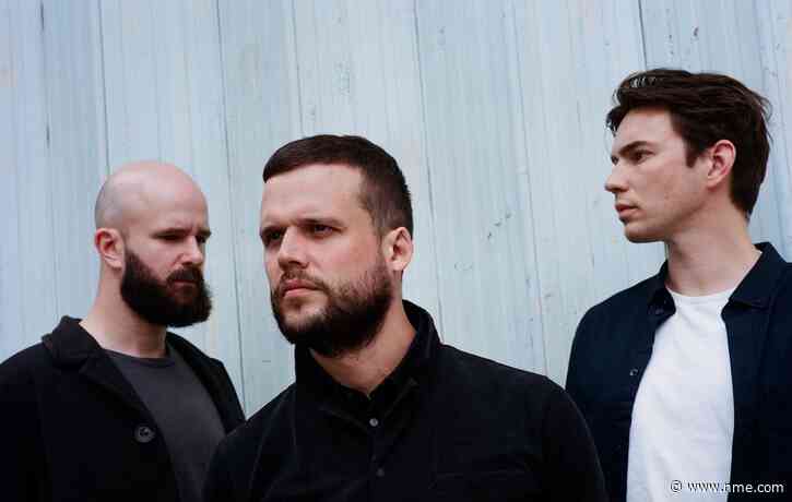 Listen to White Lies’ synth-driven new track, ‘Am I Really Going To Die’