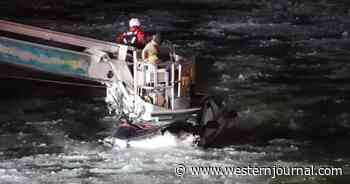 Man, Woman and Child Stuck on Car in Icy River: Police Intervene When Man Pulls Out Knife