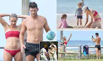 Tim Paine and wife Bonnie reconnect on a family holiday in Coolangatta following sexting scandal